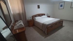 Postel nebo postele na pokoji v ubytování CasaMaPiè Binetto