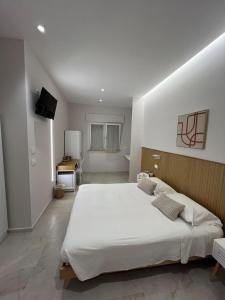 Postel nebo postele na pokoji v ubytování Light&Sand Affittacamere