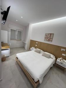 Postel nebo postele na pokoji v ubytování Light&Sand Affittacamere