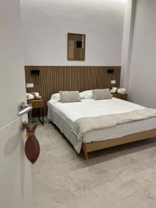 Postel nebo postele na pokoji v ubytování Light&Sand Affittacamere