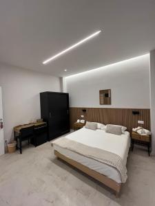 Postel nebo postele na pokoji v ubytování Light&Sand Affittacamere