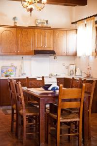 A kitchen or kitchenette at Tsivaras Villas