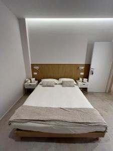 Postel nebo postele na pokoji v ubytování Light&Sand Affittacamere