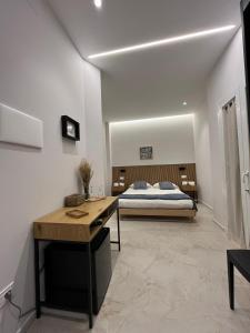 Postel nebo postele na pokoji v ubytování Light&Sand Affittacamere
