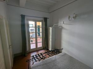 Postel nebo postele na pokoji v ubytování BonConvento Guesthouse - HiTuscany