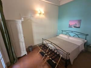 Postel nebo postele na pokoji v ubytování BonConvento Guesthouse - HiTuscany