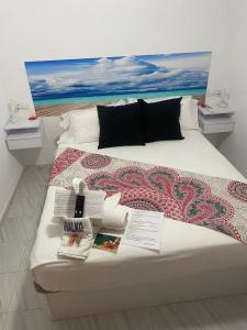 Postel nebo postele na pokoji v ubytování Hostal RENCH
