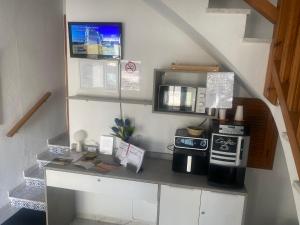 Kuchyň nebo kuchyňský kout v ubytování Hostal RENCH