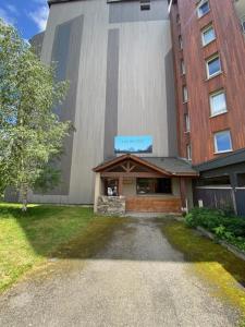 Bygningen som lejligheden ligger i + 4 billeder