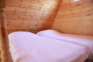 Guest house SHAM客房内的一张或多张床位