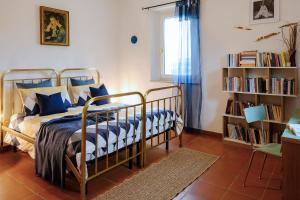 Postel nebo postele na pokoji v ubytování B&B Il Bed and Bookfast
