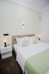 Ένα ή περισσότερα κρεβάτια σε δωμάτιο στο The Emerald Retreat