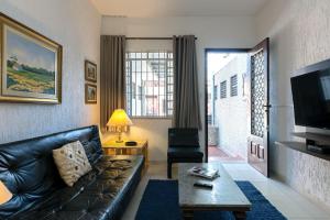 Μια τηλεόραση ή/και κέντρο ψυχαγωγίας στο Casas no Tatuapé, 2 ou 3 quartos e Garagem