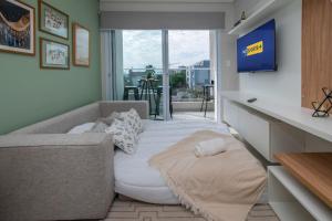 TV o dispositivi per l'intrattenimento presso Stylish 2BR Apt in Top Location