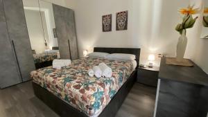Postel nebo postele na pokoji v ubytování Sicily Casa Vacanze