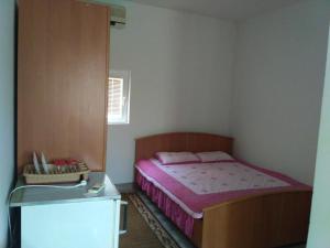 Postel nebo postele na pokoji v ubytování Guesthouse PLANINA + 5 fotografií