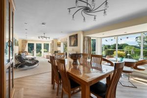 a dining room with a table and chairs at The Bay Tree Bed & Breakfast in Alton