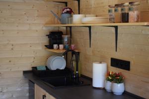 A kitchen or kitchenette at Tiny U Labe