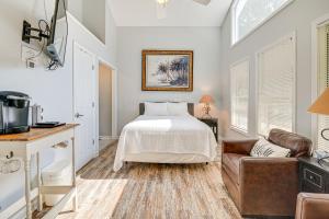 a bedroom with a bed and a couch at Murrells Inlet Studio Less Than 2 Mi to Marsh Walk in Myrtle Beach