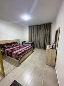 Postel nebo postele na pokoji v ubytování One bedroom Apartment in El karma aqua beach resort Hurgada near El gona + 7 fotografií