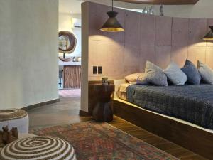 Postel nebo postele na pokoji v ubytování Villa con jacuzzi en Bacalar + 37 fotografií