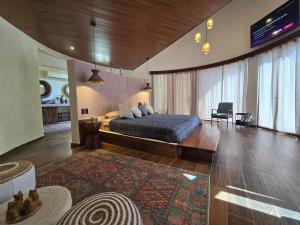 TV a/nebo společenská místnost v ubytování Villa con jacuzzi en Bacalar