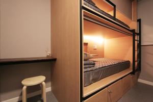 Postel nebo postele na pokoji v ubytování Blueboat Hostel Gyeongju
