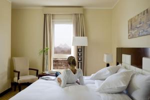 Barceló Cairo Pyramids 객실 침대