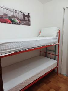 Ένα ή περισσότερα κρεβάτια σε δωμάτιο στο La Casa di Robertino +6 φωτογραφίες