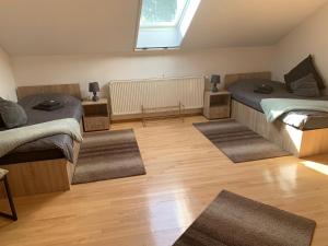 Χώρος καθιστικού στο Gemütliches & geräumiges Apartment mit Balkon