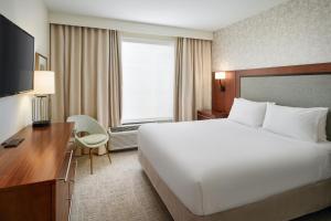 Cama ou camas em um quarto em TownePlace Suites by Marriott Orlando Downtown
