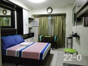 Postel nebo postele na pokoji v ubytování CEBU BUDGET STAY at HORIZONS 101 by Coleen Bedsit + 12 fotografií