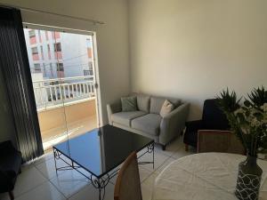 Χώρος καθιστικού στο Apartamento espaçoso de 3 quartos