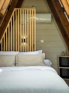 Letto o letti in una camera di Mini Villa ATIKA Luxe Tropical pour Deux