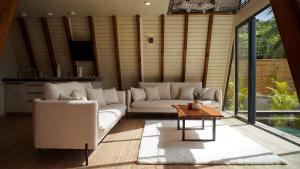 Area soggiorno di Mini Villa ATIKA Luxe Tropical pour Deux