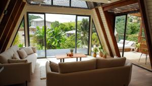 Area soggiorno di Mini Villa ATIKA Luxe Tropical pour Deux