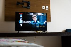 Et tv og/eller underholdning på Infinity Suites Habitación Doble 202