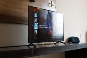 Et tv og/eller underholdning på Infinity Suites Habitación Doble 202 + 5 billeder