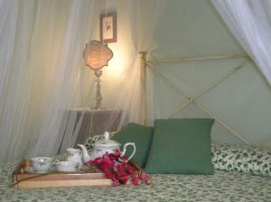 Ένα ή περισσότερα κρεβάτια σε δωμάτιο στο Villa Mustafà