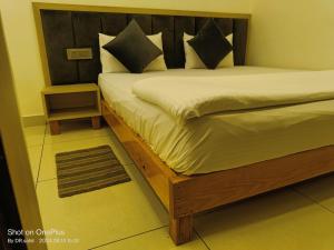 Cama o camas de una habitación en Good Vibes Hotel