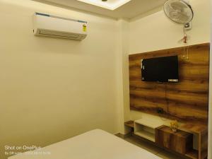 TV a/nebo společenská místnost v ubytování Good Vibes Hotel