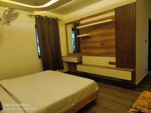 Cama o camas de una habitación en Good Vibes Hotel