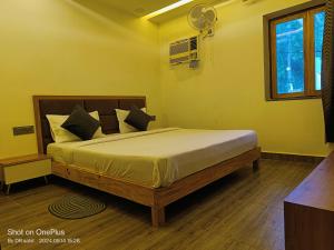 Postel nebo postele na pokoji v ubytování Good Vibes Hotel