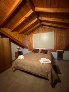 Ένα ή περισσότερα κρεβάτια σε δωμάτιο στο Dptos Andrea