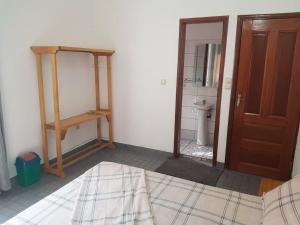 Postel nebo postele na pokoji v ubytování La Maison Blanche