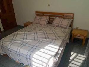 Postel nebo postele na pokoji v ubytování La Maison Blanche