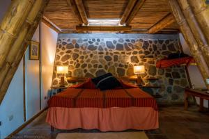 Postel nebo postele na pokoji v ubytování Reserva Natural Atitlan