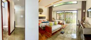 Letto o letti in una camera di The Calm Oasis