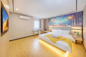 Voodi või voodid majutusasutuse Yimimi Apartment - Guangzhou 13th Line Yide Road Metro Station toas