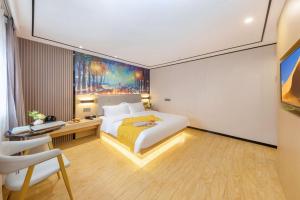 Voodi või voodid majutusasutuse Yimimi Apartment - Guangzhou 13th Line Yide Road Metro Station toas